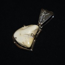 Vintage silver pendant with amber